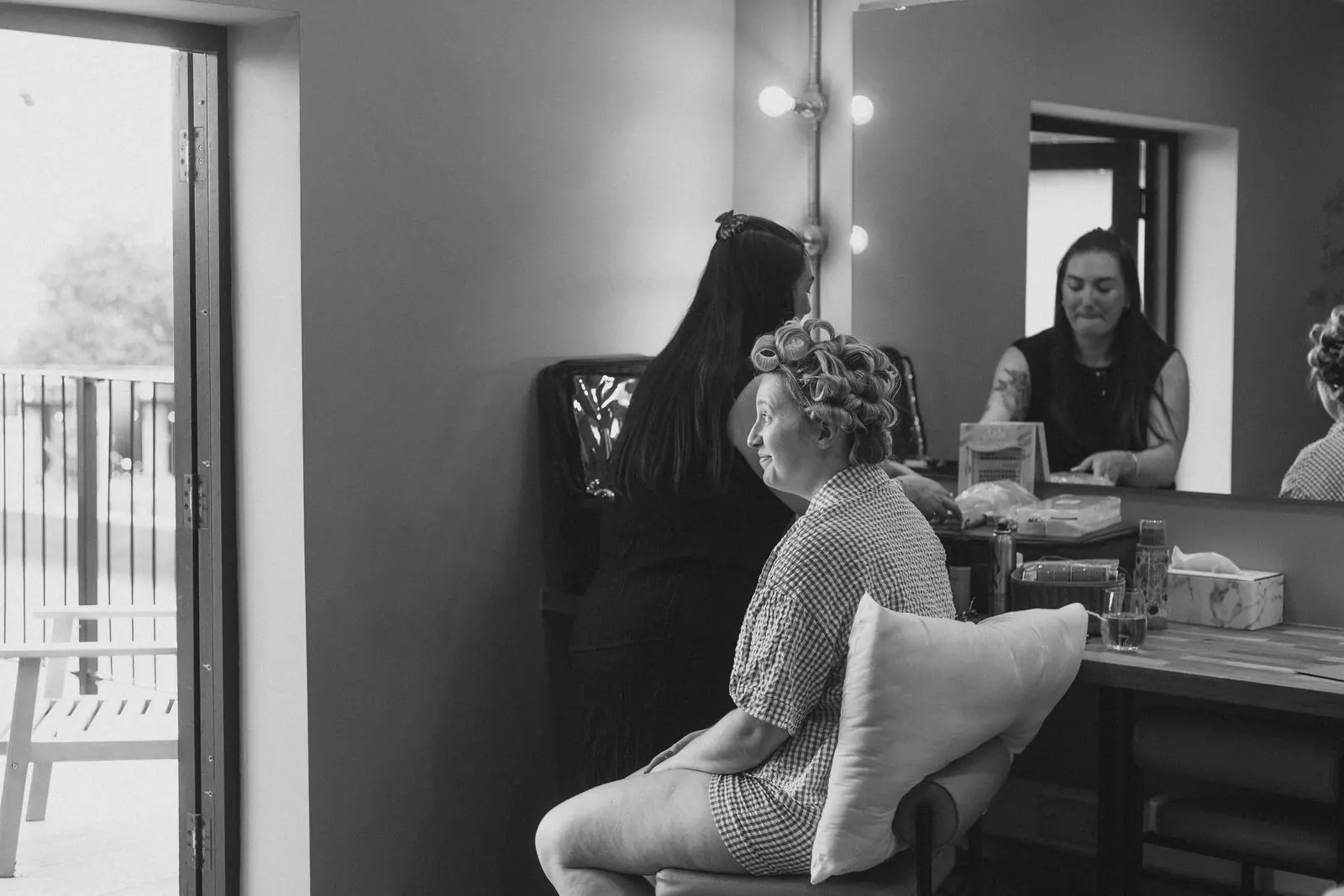 Bridal party getting ready in black and white